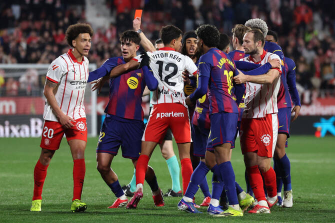 Barca suffer title defense blow in Girona derby defeat